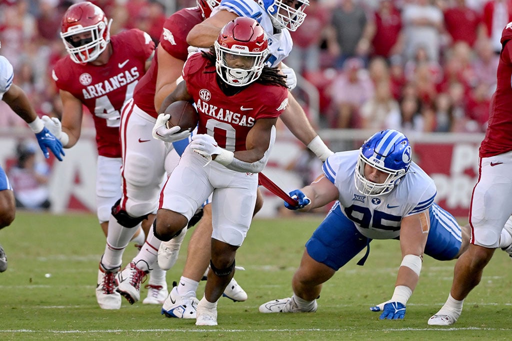 BYU rallies twice, beats Arkansas 38-31 on road to stay perfect