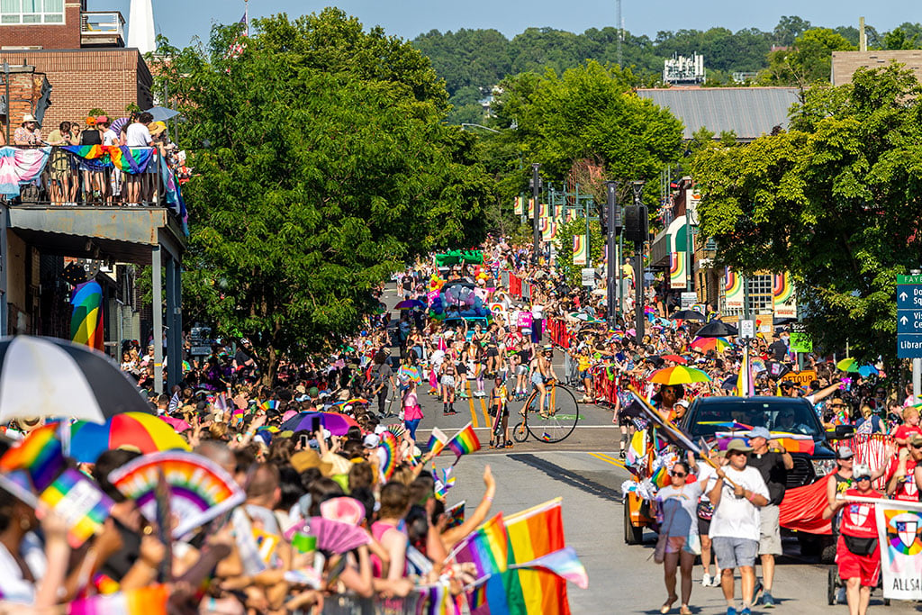 Pride parade marches on in Fayetteville as crowds beat the heat